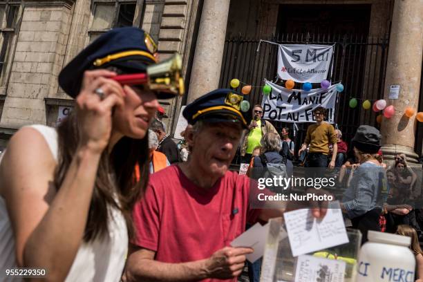 Hundreds take part in &quot;The party for Macron&quot; rally called to protest against policies of the French president on the first anniversary of...