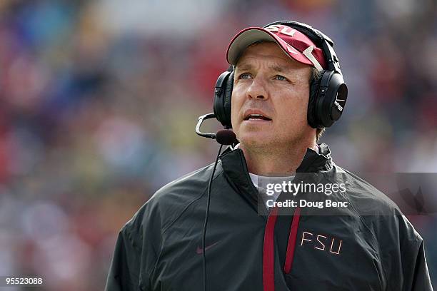 Offensive coordinator and future head coach Jimbo Fisher of the Florida State Seminoles walks the sidelines while taking on the West Virginia...