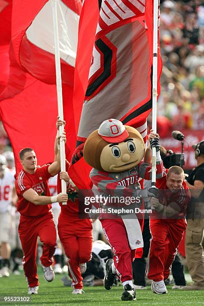 Brutus Buckeye leads the Ohio State Buckeyes onto the field prior to the game against the Oregon Ducks at the 96th Rose Bowl game on January 1, 2010...
