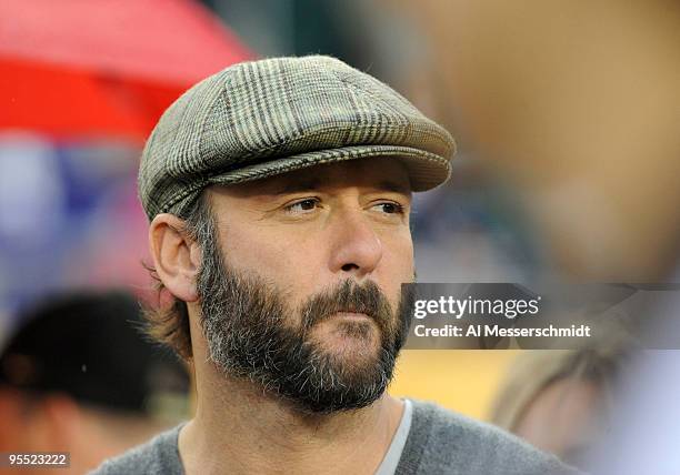 Singer Tim McGraw watches pre-game ceremonies before the Northwestern Wildcats play against the Auburn Tigers in the Outback Bowl January 1, 2010 at...