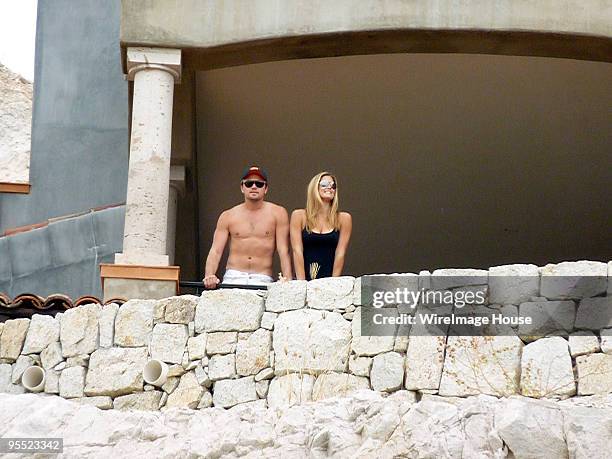 Actor Leonardo DiCaprio and Israeli supermodel Bar Refaeli enjoy their seaside view January 1, 2010 in Cabo San Lucas, Mexico.