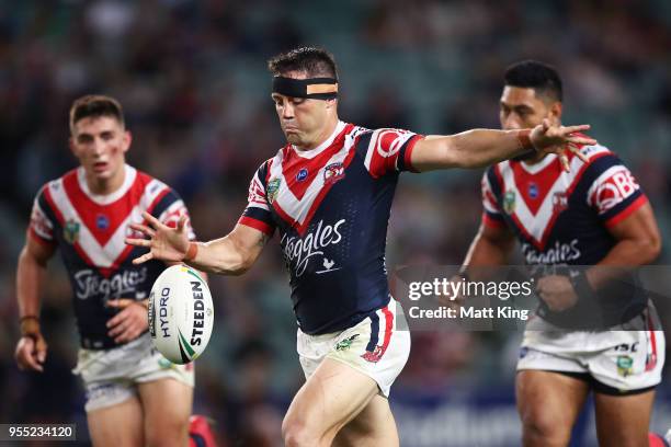 Cooper Cronk of the Roosters kicks during the round nine NRL match between the Sydney Roosters and the Manly Warringah Sea Eagles at Allianz Stadium...