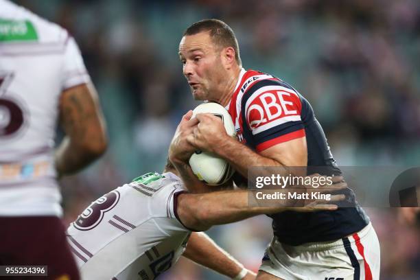 Boyd Cordner of the Roosters is tackled during the round nine NRL match between the Sydney Roosters and the Manly Warringah Sea Eagles at Allianz...