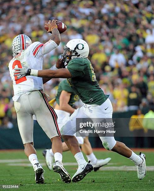 Linebacker Kenny Rowe of the Oregon Ducks sacks Terrelle Pryor of the Ohio State Buckeyes in the second half at the 96th Rose Bowl game on January 1,...