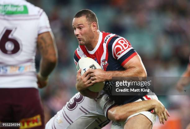 Boyd Cordner of the Roosters is tackled during the round nine NRL match between the Sydney Roosters and the Manly Warringah Sea Eagles at Allianz...