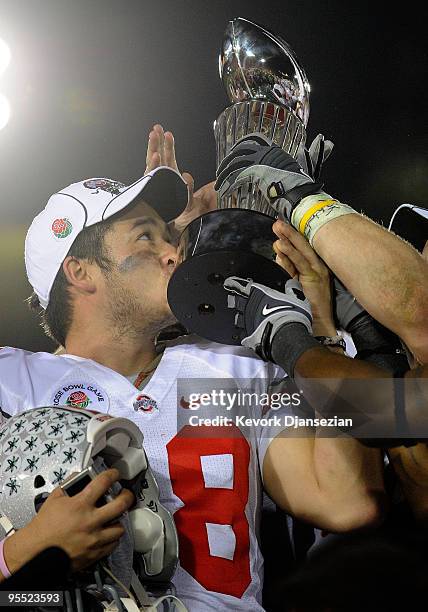 Punter Jon Thoma of the Ohio State Buckeyes kisses the Rose Bowl championship trophy after the buckeyes 26-17 win in the 96th Rose Bowl game over the...