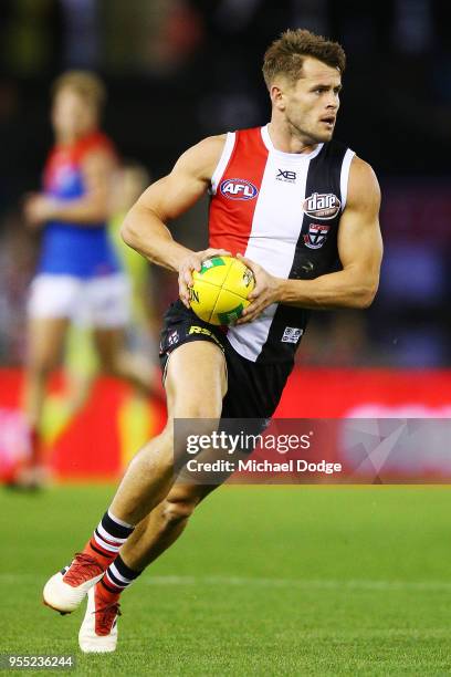 Maverick Weller of the Saints looks upfield during the round seven AFL match between St Kilda Saints and the Melbourne Demons at Etihad Stadium on...