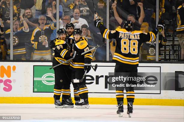 Patrice Bergeron of the Boston Bruins celebrates his goal against the Tampa Bay Lightning in Game Four of the Eastern Conference Second Round during...