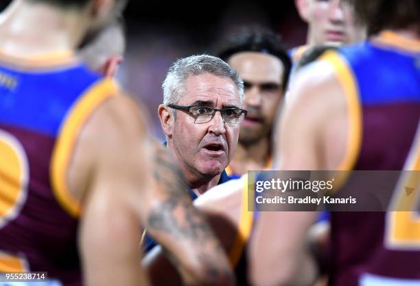 Coach Chris Fagan of the Lions at the 3rd quarter time break during the round seven AFL match between the Brisbane Lions and the Collingwood Magpies...