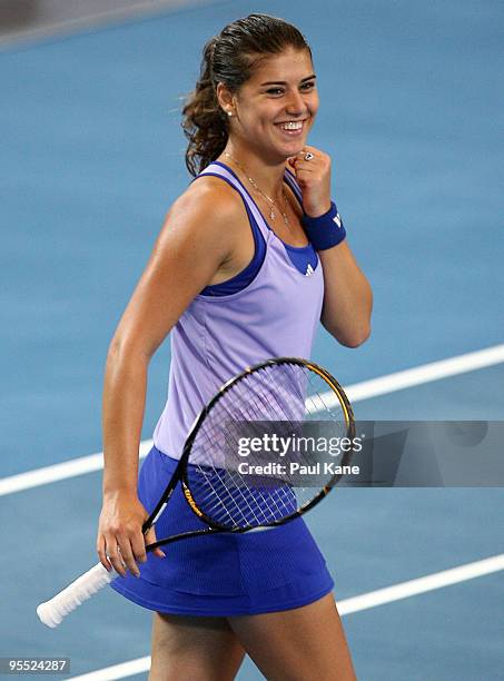 Sorena Cirstea of Romania celebrates defeating Samantha Stosur of Australia in the Group A match between Australia and Romania during day one of the...