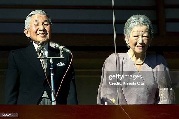 Emperor Akihito and Empress Michiko greet the well-wishers celebrating the New Year at the Imperial Palace on January 2, 2010 in Tokyo, Japan.