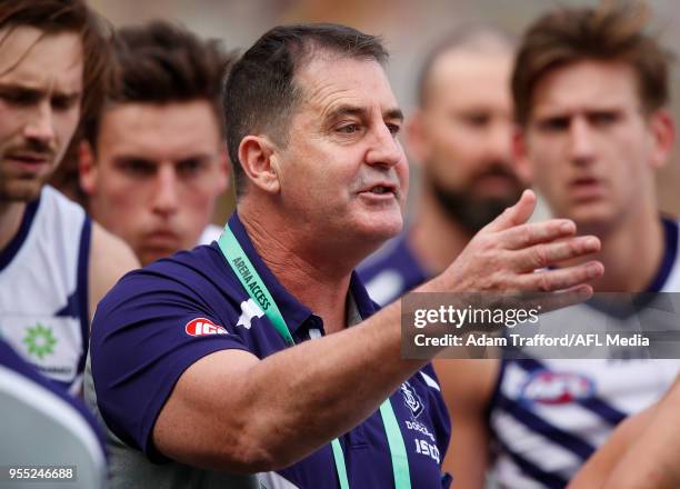 Ross Lyon, Senior Coach of the Dockers addresses his players during the 2018 AFL round seven match between the Richmond Tigers and the Fremantle...