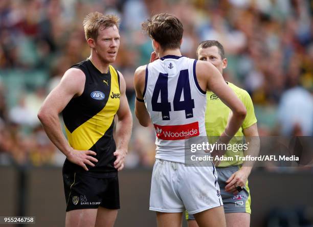 Jack Riewoldt of the Tigers chats with Taylin Duman of the Dockers after Duman disputed a goal to Dustin Martin of the Tigers which was then...