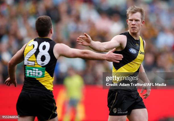 Jack Riewoldt of the Tigers \celebrates a goal with Jack Higgins of the Tigers during the 2018 AFL round seven match between the Richmond Tigers and...