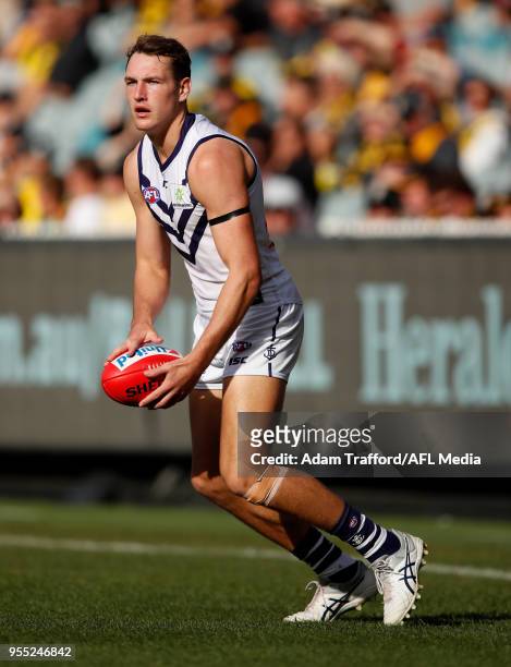 Brennan Cox of the Dockers in action during the 2018 AFL round seven match between the Richmond Tigers and the Fremantle Dockers at the Melbourne...