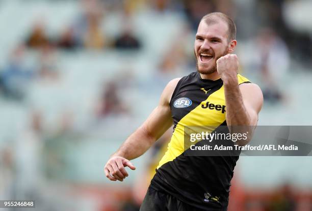 Kamdyn McIntosh of the Tigers celebrates a goal during the 2018 AFL round seven match between the Richmond Tigers and the Fremantle Dockers at the...