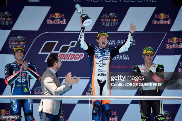 First placed Schedl GP Racing's German rider Philipp Oettl , second placed Redox PruestelGP's Italian rider Marco Bezzecchi and third placed Bester...