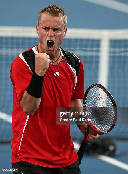 Lleyton Hewitt of Australia celebrates a point in his/her match against Victor Hanescu of Romania in the Group A match between Australia and Romania...