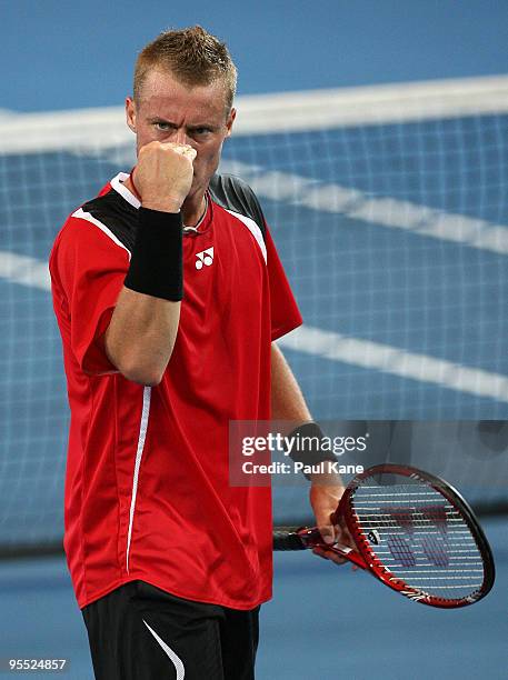 Lleyton Hewitt of Australia celebrates a point in his match against Victor Hanescu of Romania in the Group A match between Australia and Romania...