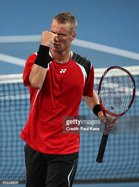 Lleyton Hewitt of Australia celebrates a point in his match against Victor Hanescu of Romania in the Group A match between Australia and Romania...