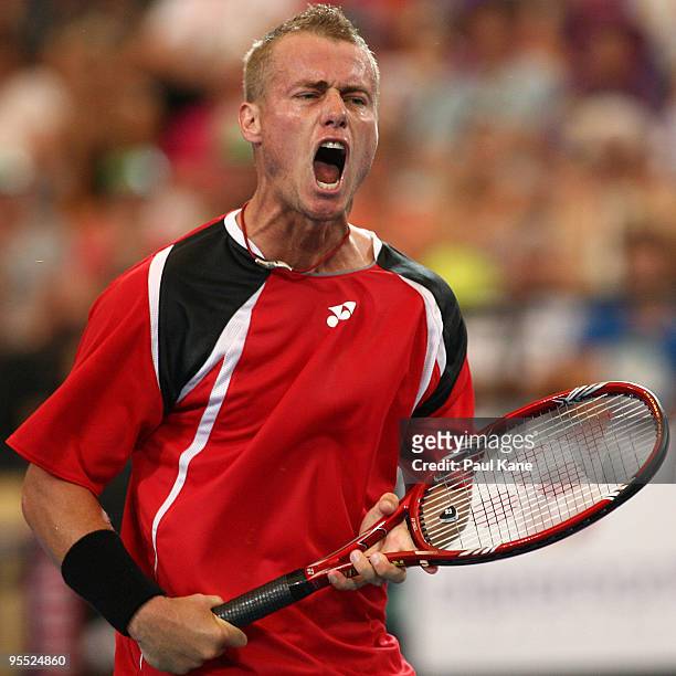 Lleyton Hewitt of Australia celebrates a point in his match against Victor Hanescu of Romania in the Group A match between Australia and Romania...