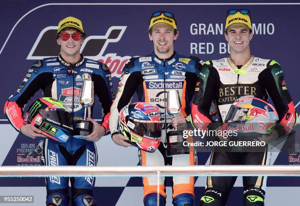 First placed Schedl GP Racing's German rider Philipp Oettl , second placed Redox PruestelGP's Italian rider Marco Bezzecchi and third placed Bester...