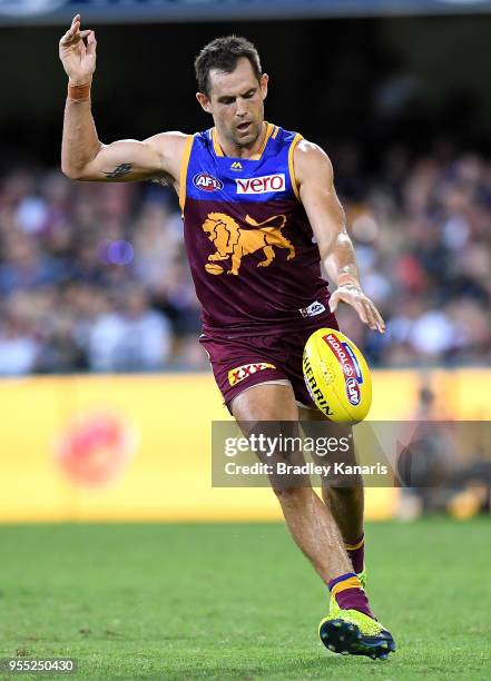 Luke Hodge of the Lions kicks the ball during the round seven AFL match between the Brisbane Lions and the Collingwood Magpies at The Gabba on May 6,...