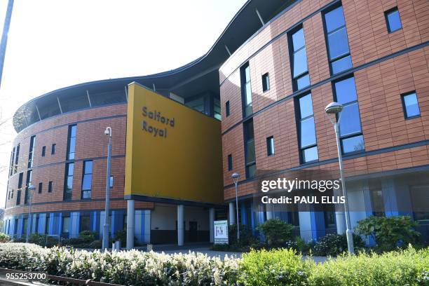 The exterior of the Salford Royal Hospital is pictured in Salford, Greater Manchester on May 6, 2018. - Messages of support continued to pour in as...