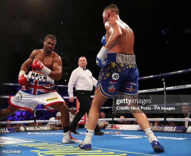 Tony Bellew knocks down David Haye in the Heavyweight Contest with trainer Dave Coldwell at the O2 Arena, London. PRESS ASSOCIATION Photo. Picture...