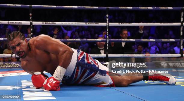 David Haye after being knocked down by Tony Bellew in the Heavyweight Contest with trainer Dave Coldwell at the O2 Arena, London. PRESS ASSOCIATION...