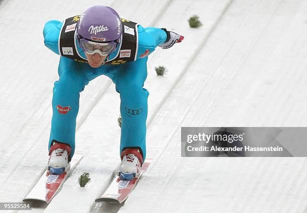 Martin Schmitt of Germany competes during the trial round of the FIS Ski Jumping World Cup event of the 58th Four Hills ski jumping tournament on...