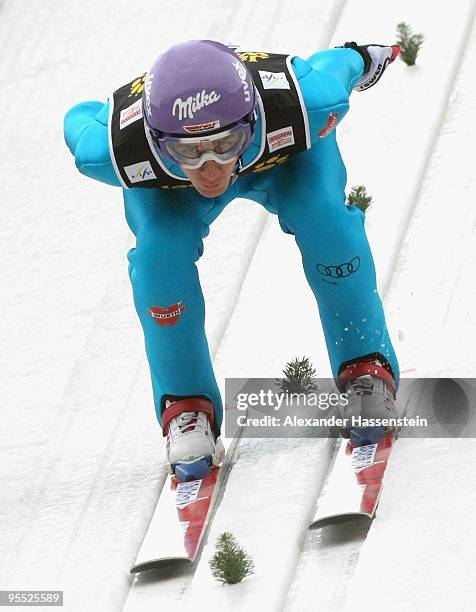Martin Schmitt of Germany competes during the trial round of the FIS Ski Jumping World Cup event of the 58th Four Hills ski jumping tournament on...