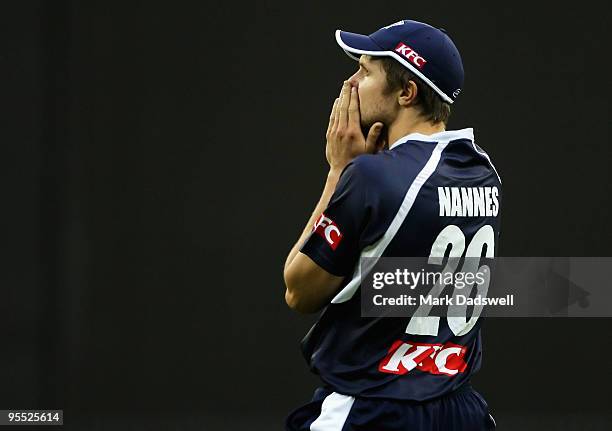 Dirk Nannes of the Bushrangers looks concerned as the Blues total increases during the Twenty20 Big Bash match between the Victorian Bushrangers and...