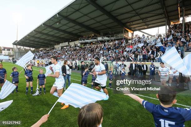 Players arrive on the pitch during the French Top 14 match between Racing 92 and SU Agen on May 5, 2018 in Vannes, France.