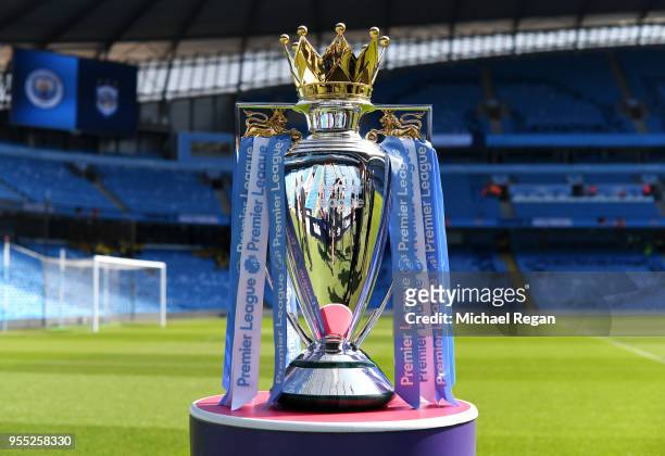 The Premier League Trophy on display prior to the Premier League match between Manchester City and Huddersfield Town at Etihad Stadium on May 6, 2018...
