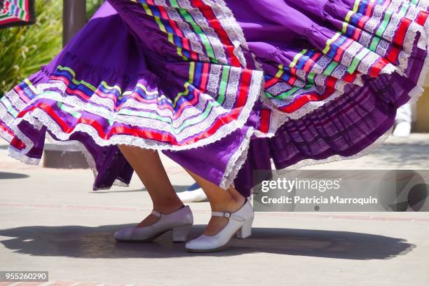 colorful mexican folklorico dancer - folkloric stock-fotos und bilder