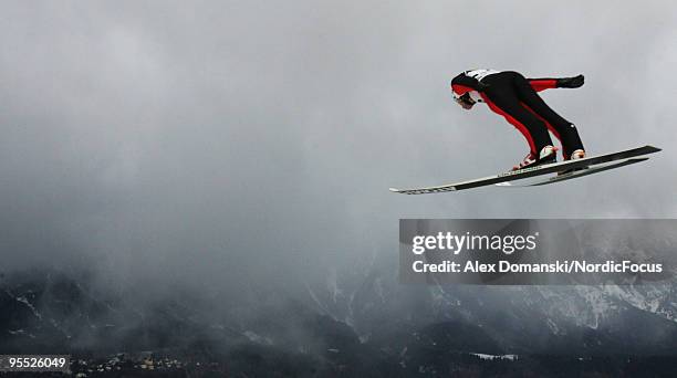 Bjoern Einar Romoeren of Norway competes during trial round of the FIS Ski Jumping World Cup event of the 58th Four Hills ski jumping tournament on...