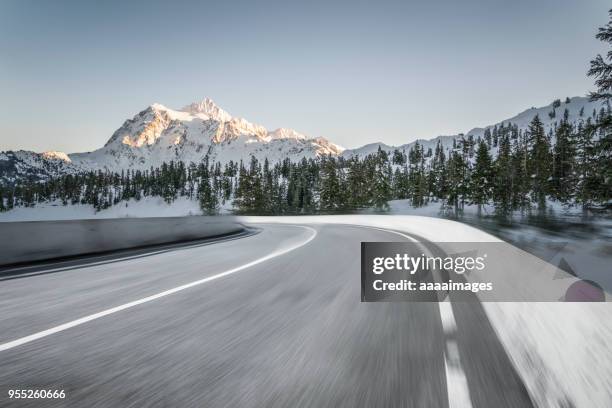 blurred motion mountain road,mt.baker - snow top mountain pine tree stock pictures, royalty-free photos & images