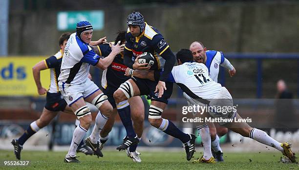 Marco Wentzel of Leedsis tackled by Shontayne Hape of Bath during the Guinness Premiership match between Leeds Carnegie and Bath at Headingley...