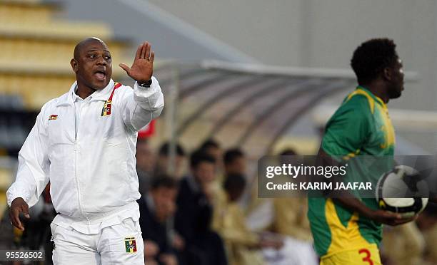 Mali's national football team coach Stephen Keshi gives instructions to his players during their 9th International Friendship Tournament football...