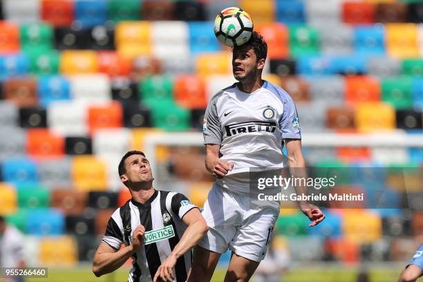 Kevin Lasagna of Udinese Calcio battles for the ball with Andrea Ranocchia of FC Internazionale during the serie A match between Udinese Calcio and...