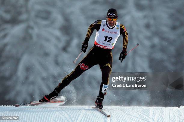 Ronny Ackermann of Germany competes during the Cross Country event of the FIS Nordic Combined World Cup at the Hans-Renner-Schanze on January 2, 2010...