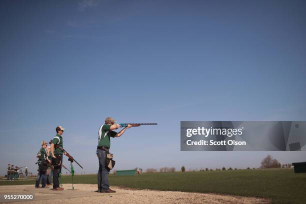 Students from the Osage High School trap team compete in a trapshooting match at the Mitchell County Trap Range on May 5, 2018 in Osage, Iowa. The...