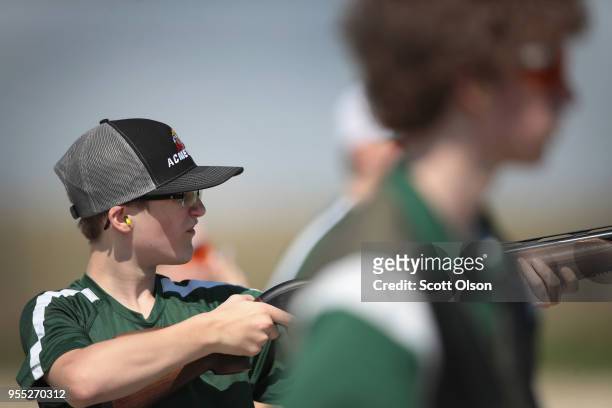 Freshman Matthew Abben of the Osage High School trap team competes in a match at the Mitchell County Trap Range on May 5, 2018 in Osage, Iowa. The...