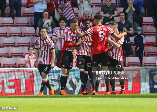 Ovie Ejaria of Sunderland celebrates scoring the opening goal with team-mates during he Sky Bet Championship match between Sunderland and...