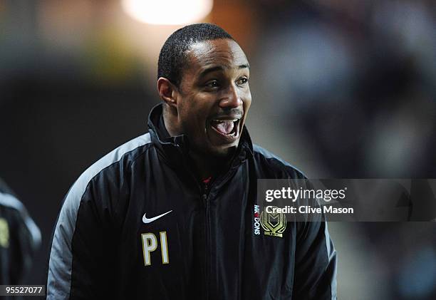 Manager Paul Ince of MK Dons shouts to players during the FA Cup 3rd Round match between MK Dons and Burnley at Stadiummk on January 2, 2010 in...