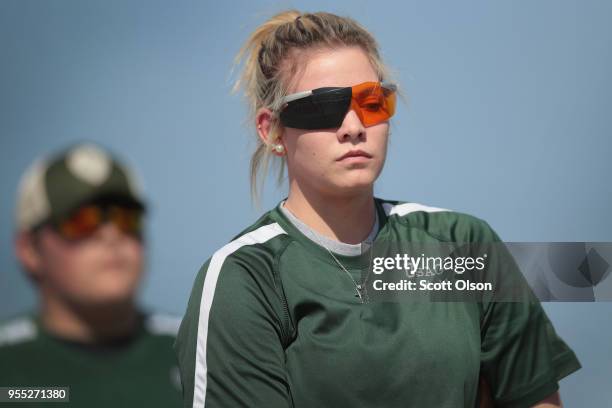 Senior Mady Dohlman of the Osage High School trap team competes in a match at the Mitchell County Trap Range on May 5, 2018 in Osage, Iowa. The Osage...