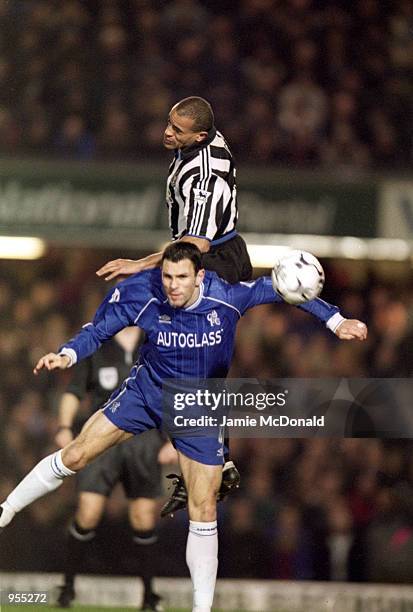 Alain Goma of Newcastle United rises above Gustavo Poyet of Chelsea during the FA Carling Premiership match played at Stamford Bridge, in London....