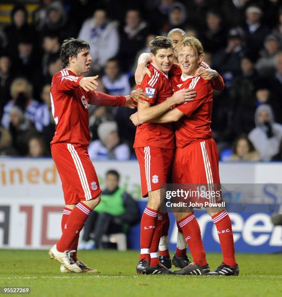Dirk Kuyt of Liverpool celebrates with goal scorer Steven Gerrard after he scored the equalizing goal during the FA Cup 3rd round match between...