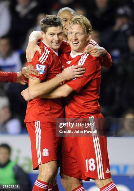 Dirk Kuyt of Liverpool congratulates goal scorer Steven Gerrard after he scored the equalizing goal during the FA Cup 3rd round match between Reading...
